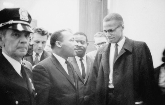 Martin Luther King and Malcolm X waiting for press conference